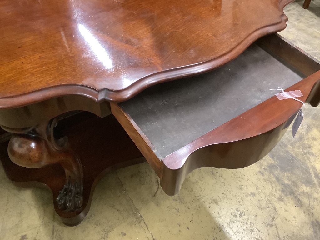 A Victorian mahogany two tier console table, width 120cm, depth 64cm, height 76cm